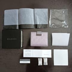 【未使用​/付属品完備】GUCCI グッチ 二つ折り財布 GGキャンバス ピンクのサムネイル