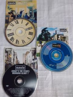 Oasis CD シングル・アルバム 12枚セット オアシスのシングル盤アートワーク秘話～オアシスの世界観を見事に