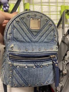 MCM デニムスタッズリュック 限定版 - メルカリ