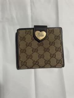 GUCCI 二つ折り財布 GGキャンバス - メルカリ