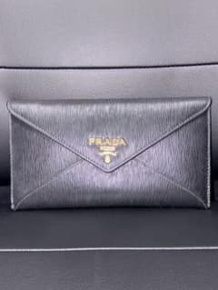 PRADA エンベロープウォレット ブラックレザー長財布 - メルカリ