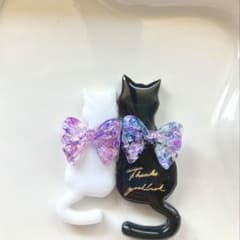 レジン ヘアゴム 黒猫ちゃんと白猫ちゃん◡̈♥︎ リボン - メルカリ