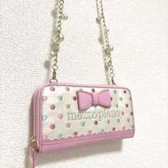 [Brand new, unused] Mezzo Piano women's wallet with ink marks and peeling on the inside and chain.