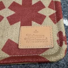 Vivienne Westwood clutch bag, orb design, polka dot pattern, linen, with dust bag.
