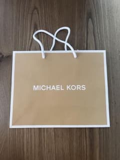 MICHAEL KORS ベージュ紙袋のサムネイル