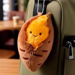 オレンジ色の笑顔のぬいぐるみ - メルカリ