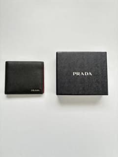 最終値下げ 7/1削除予定 PRADA 二つ折り財布 バイカラー 最終値下げ 7/1削除予定 PRADA 二つ折り財布 バイカラー - メルカリ