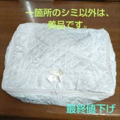 Fabric storage bag (white) that doubles as a travel organizer bag! Features a ribbon accent and floral frills.