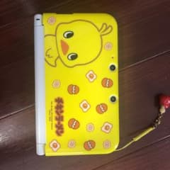 3DS LL 本体　充電器　カセットとカセットケース付きのサムネイル