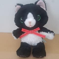 黒猫 ぬいぐるみ 赤いリボン付きのサムネイル