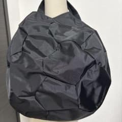 Comme des Garçons soccer ball shaped bag