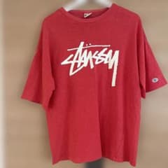 Stussy x Champion コラボ Tシャツ レッド - メルカリ