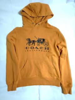 COACH オレンジ フード付きパーカーのサムネイル