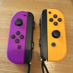 Nintendo Switch オレンジ・紫 Joy-Con スマブラ付き Nintendo Switch Joy-Con 紫オレンジ - メルカリ