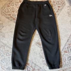 Stussy x Champion スウェットパンツ ブラックのサムネイル