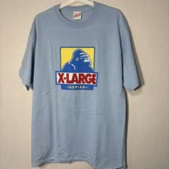 XLARGE IKSPIARITシャツ ライトブルー（ドナルド柄） Lサイズのサムネイル