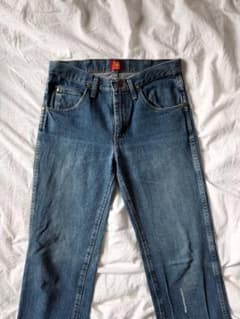 Wrangler denim, faded/repaired, purchased in the USA.