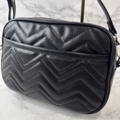 Almost new, unbranded quilted mini shoulder bag, black.
