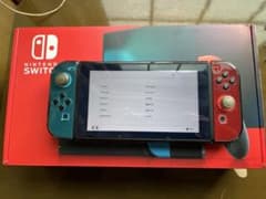 美品　Nintendo Switch 赤/青 本体（プロコン、メモリーカード付）のサムネイル