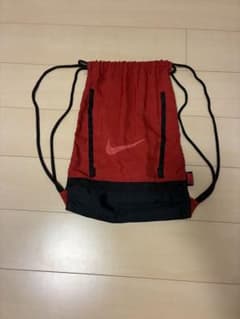 NIKE ナイキ シューズバッグ ナップサック レッド ブラック BA4529のサムネイル