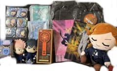 Jujutsu Kaisen merchandise bundle: plush toys, badges, clear files, backpack.