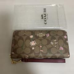 【新品未使用】COACH 長財布 シグネチャー 花柄 ストラップ付 保存袋ありのサムネイル