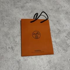HERMES オレンジ ショッピングバッグ - メルカリ