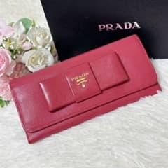 PRADA 長財布 サフィアーノ フィオッコ リボン ピンク - メルカリ
