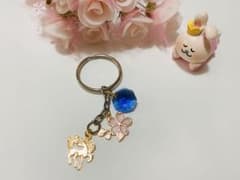 桜とユニコーンと青いビジューのキーホルダー☆ハンドメイドのサムネイル