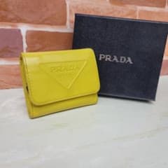 PRADA☆鑑定済☆GRACE TRIANG イエロー1MH044 プラダ財布 - メルカリ
