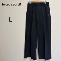 Le Coq Sportif wide-leg pants, black, embroidered, drawstring waist, simple, plain design.