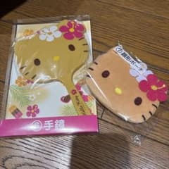 [新品未使用] 日焼けキティ　一番くじ　顔型ポーチ　手鏡セットのサムネイル