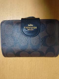 COACH 二つ折り財布 シグネチャー柄 ブラウンのサムネイル