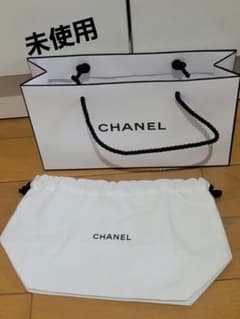 未使用CHANEL巾着ポーチホワイト系ノベルティ&ショッパー - メルカリ