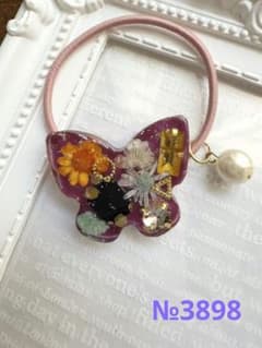 №3898 蝶々型フラワーレジンヘアゴム - メルカリ