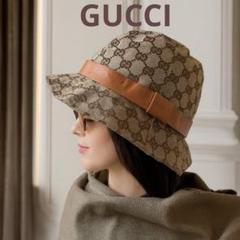 美品✨GUCCI グッチGG柄 バケットハットM レザーリボン 黒　ユニセックス グッチ 帽子 GG柄 デニム ブラック 黒 GG ハット L メンズ