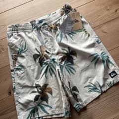 Brand new Quiksilver floral print men's swimsuit, size S.