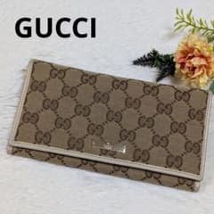 希少❣️グッチ 長財布 フラップ GGキャンバス × レザー ロゴプレート 