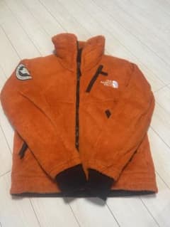 THE NORTH FACE オレンジ フリースジャケットのサムネイル