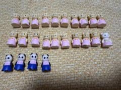 Sylvanian Families Figure Collection: 24 figures including bears, cats, and pandas.