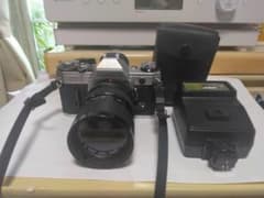 Canon AE-1 フィルム一眼レフカメラ ズームレンズ ストロボ付 - メルカリ
