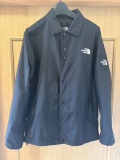 THE NORTH FACE コーチジャケット ブラック NP22030のサムネイル