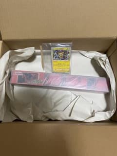 リザードンプレイマット&いたずら好きのピチューのサムネイル