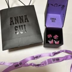 Brand new Anna Sui butterfly design earrings in pink.