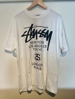 STUSSY Tシャツ 白 WORLD TOUR - メンズ Lサイズのサムネイル