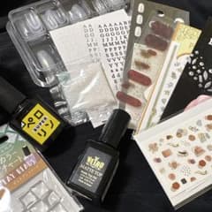 Nail art set: Nail stickers, tips, and gel