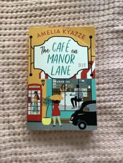 The Café on Manor Lane Amelia Kyazze 洋書のサムネイル