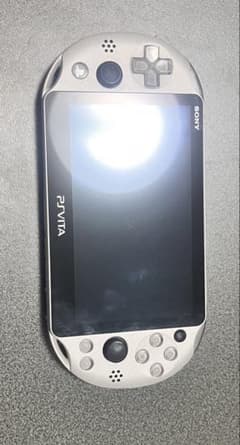 T*迎様 PS Vita シルバー 本体 ジャンク品のサムネイル