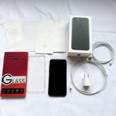 Apple iPhone 7 32GB SIM-free, genuine earphones, box, and instruction manual included.