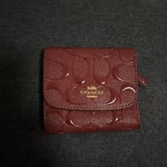 COACH バーガンディ 三つ折り財布のサムネイル